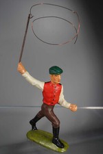 Bauer mit Peitsche für